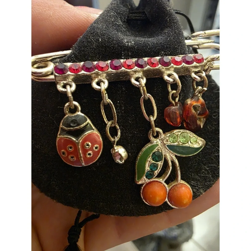 Avon charming pin